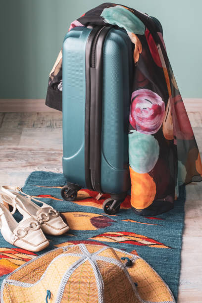 istock Suitcase and summer things. Fees on vacation at sea. 1207674071