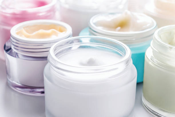 Beauty and fashion. Close-up open jars of face creams. moisturizer stock pictures, royalty-free photos & images