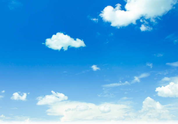 istock Blue sky background and white clouds in the air. 1207675195