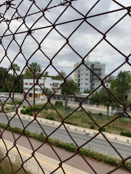 istock Cyprus border Turkish Greek side wire mesh 1207677253