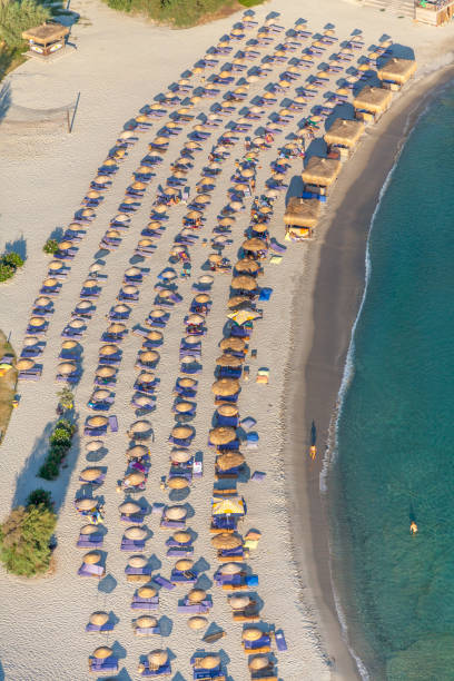 istock beach crowd from aerial look 1207678825