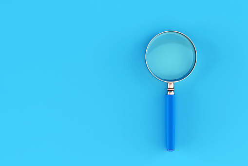 3D Magnifying Glass Isolated on Blue Background