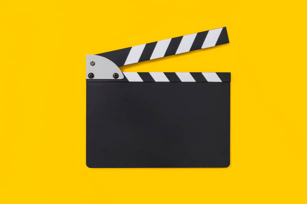 quadro de palmas de filme em fundo amarelo - clapboard - fotografias e filmes do acervo