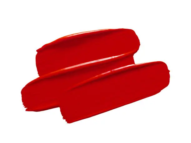 Photo of Red lipstick strokes on white