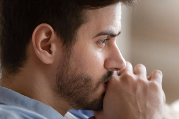 istock Pensive male lost in thoughts thinking of life problems 1207696855