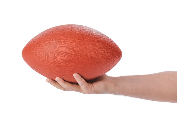 istock Hand and rugby ball 1207706144