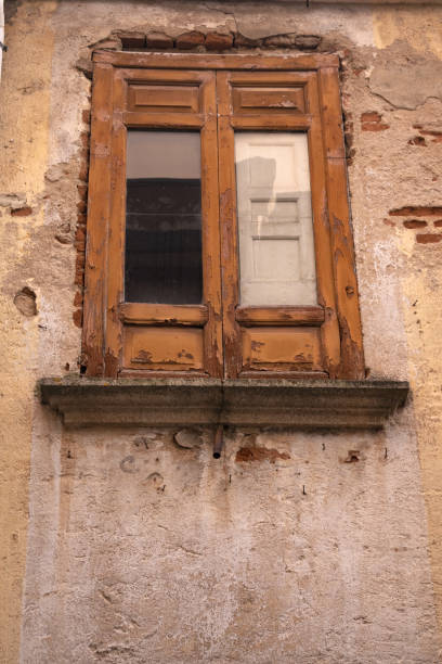 istock old windows of an abandoned home 1207706198