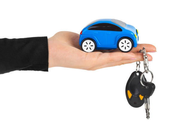 istock Hand with keys and car 1207707244