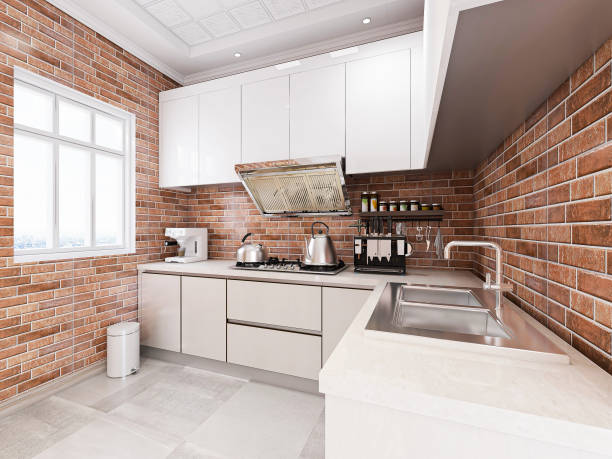 istock 3D rendering, modern family kitchen design, new white cabinets and kitchenware in the spacious red brick wall room, beside the green plants. 1207713842