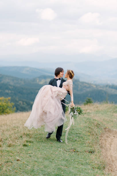 istock Running couple enjoying honeymoon adventure 1207714442