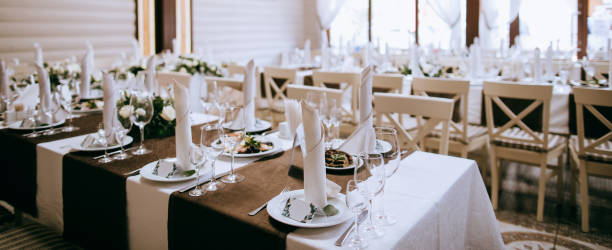 istock elegant table setting on wedding party in restaurant. Catering service 1207717869