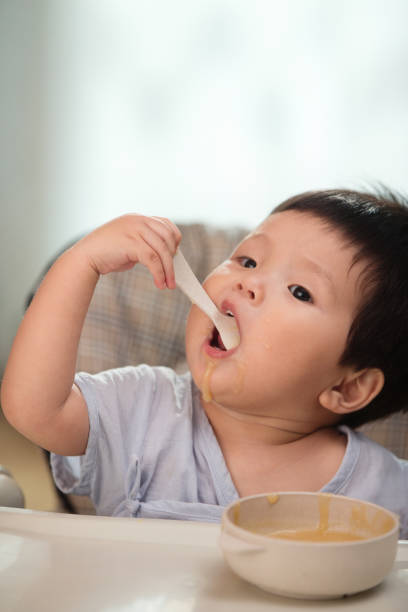 istock The baby to eat 1207719431