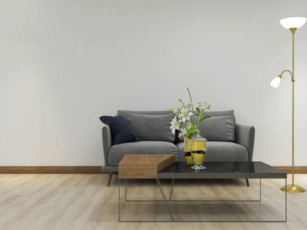 istock 3D rendering, simple modern living room sofa with coffee table, with green plants on the table. 1207721856