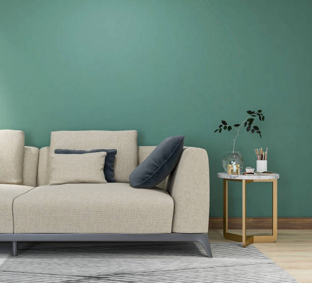 istock 3D rendering, simple modern living room sofa with coffee table, with green plants on the table. 1207721862