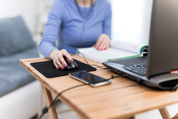 istock Woman using laptop - freelance job, working on a computer. 1207722754