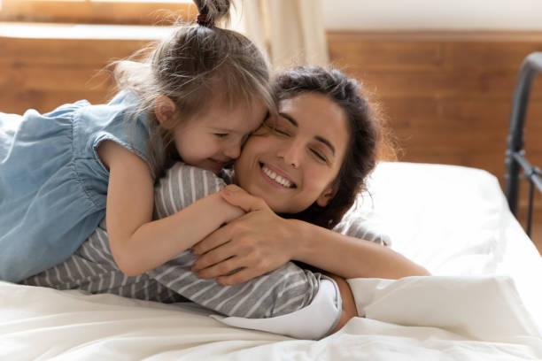 istock Affectionate bonding family of two enjoy tender moment. 1207723256