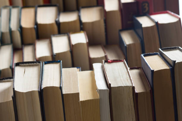 istock Old and used hardback books or text books from above. 1207725124