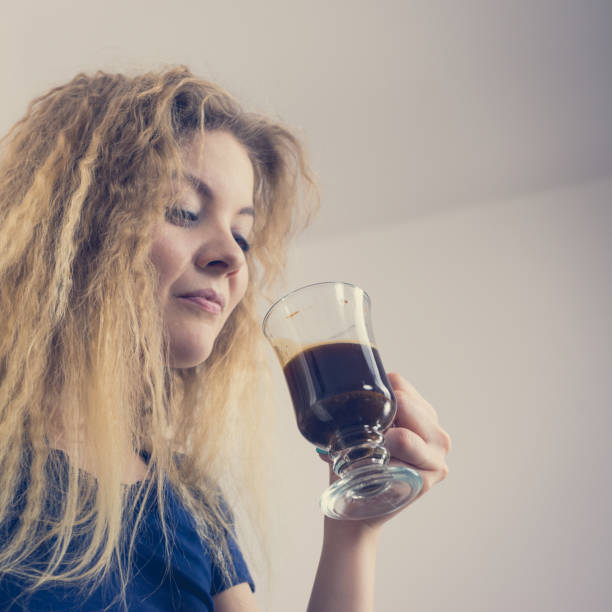 istock Positive woman drinking her morning coffee 1207725250