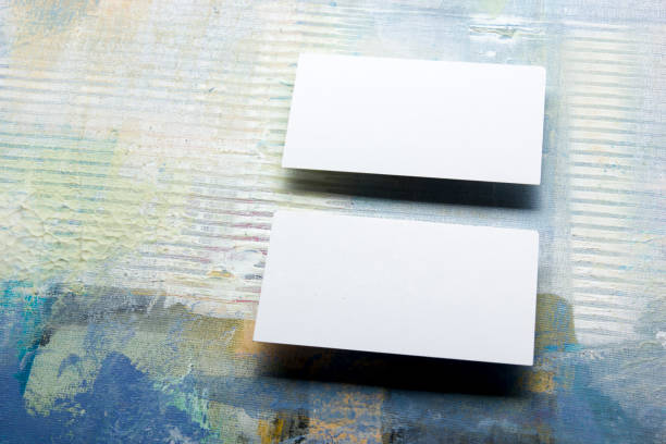 istock Business cards blank. Mockup on color background. Flat Lay. copy space for text 1207726216