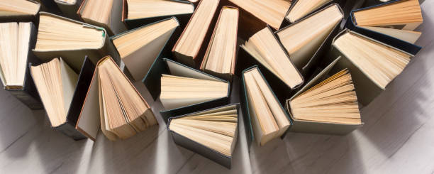 istock Old and used hardback books or text books from above. 1207726939