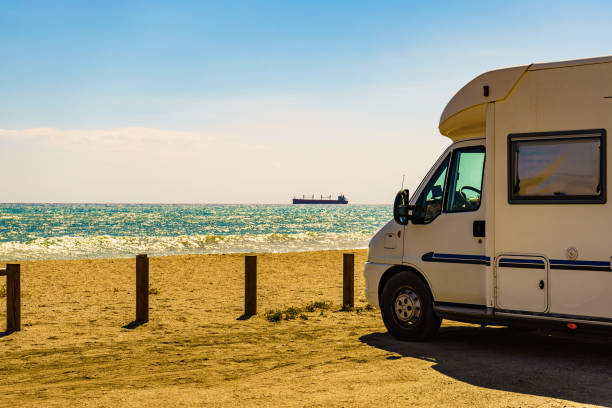 istock Camper car on beach, Andalucia Spain 1207727484