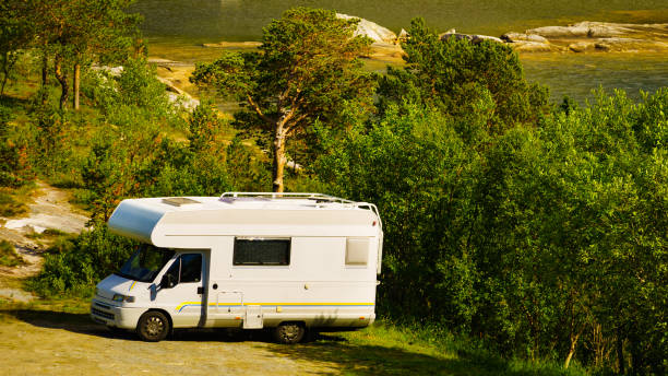 istock Camper car camp on norwegian nature 1207731211