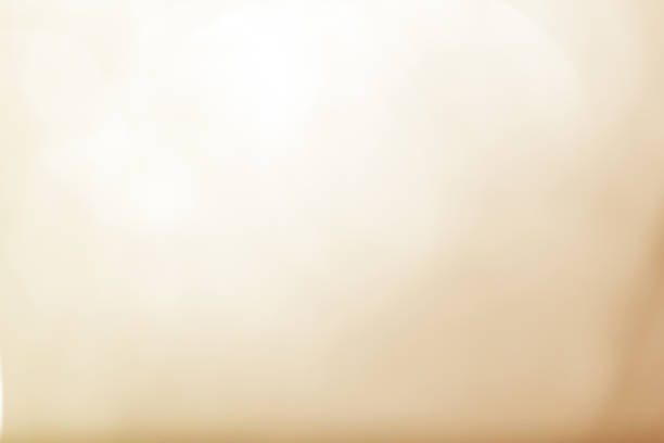 istock Abstract bokeh sparkle on yellow and gold background 1207731317