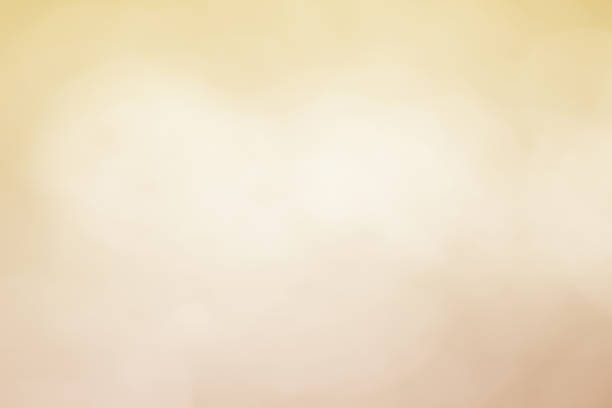 istock Abstract bokeh sparkle on yellow and gold background 1207731394