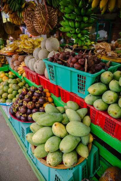 istock Fresh fruit market with mango, mangosteen and pineapple in Asia, Bali 1207732506