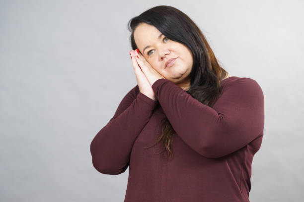 istock Woman being sleepy gesturing 1207733983