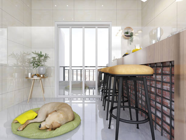 istock Spacious and bright open balcony with bar, greenery and puppies resting 1207735346