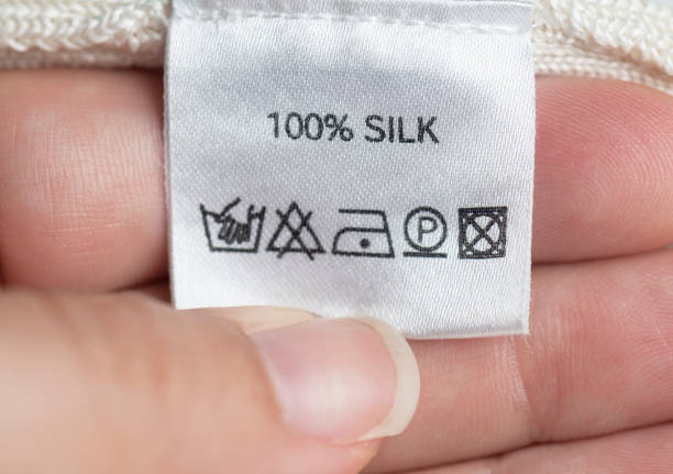 %100 silk clothes label - 100 percent fotos imagens e fotografias de stock
