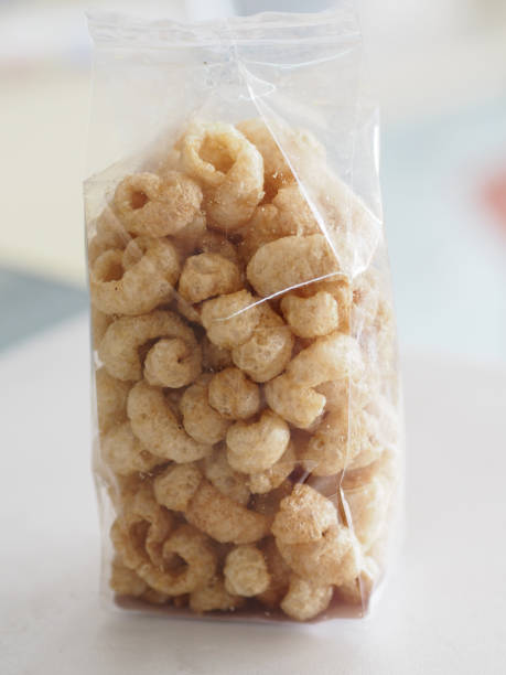 istock pork snack, rind, scratching or crackling food packed in a clear plastic bag 1207742199