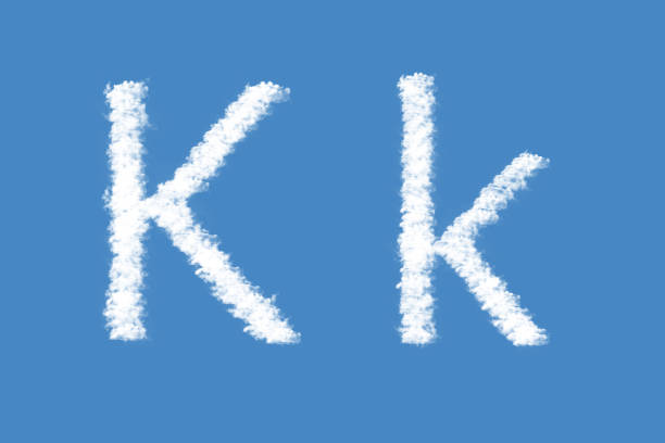 istock Letter K from real clouds shapes. Cloud alphabet. 1207742855