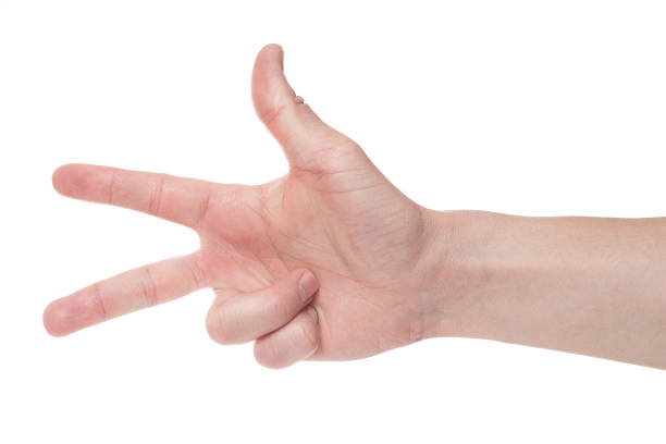 istock Man showing number three on white background, closeup. 1207743550