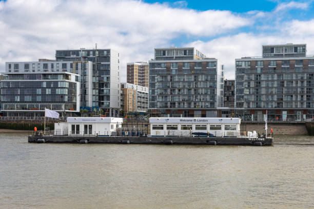istock Pier for Tourist Ship Docking on River Thames, London 1207744932