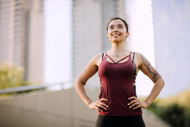 istock Satisfied young woman after good jogging 1207748560
