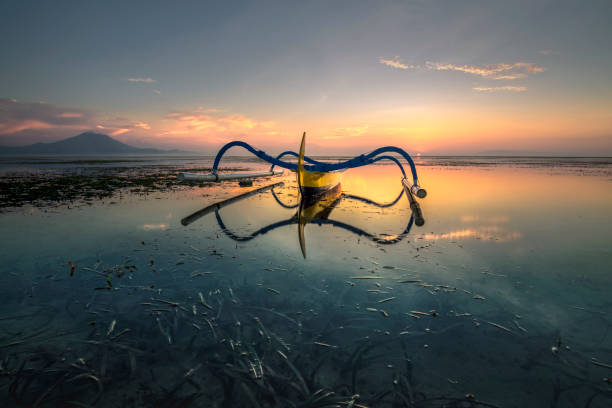 traditional boat at coral beach sanur bali indonesia