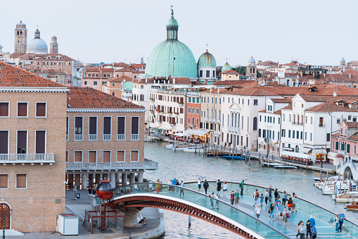 Canal Grande and Basilica di Santa Maria della Salute, Chrunch ,Venice, Italy, with tourist enjoy travel on the water gondola boat