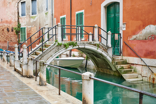 Footbridge and sidewalk in Fondamenta degli Arsenalotti. Castello Sestier. Venice. Italy.