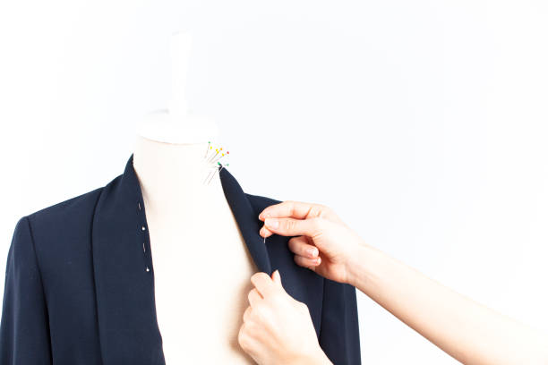 istock fashion designer working with tailor's dummy 1207751860