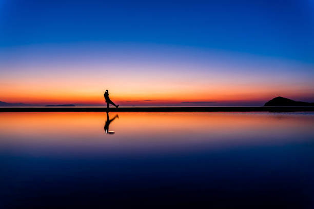 istock japan kagawa ocean person silhouette 1207753062