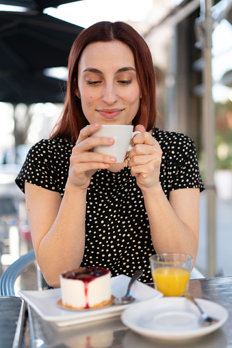 Woman drinking a coffee