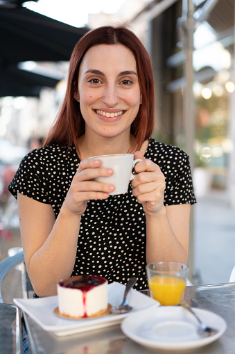 Woman drinking a coffee