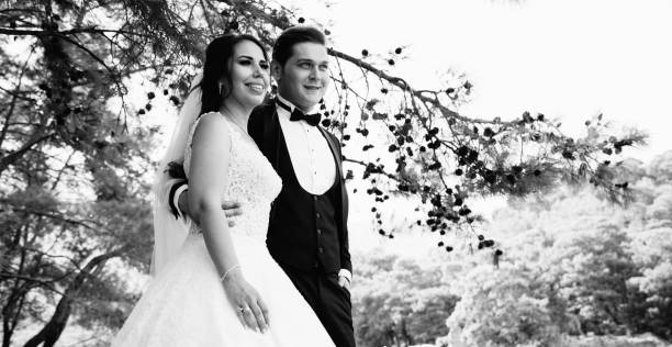 istock Cheerful married couples at the wedding ceremony 1207754437