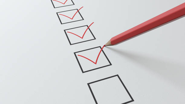 istock 3d render checklist a red pencil will tick in black squares 1207761323