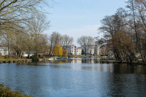 istock modern apartment buildings by the water in Berlin, Germany 1207761545