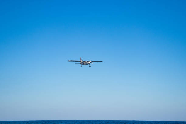 istock small sea plane above the sea 1207766716