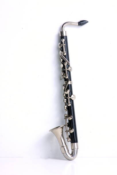 clarinetto basso isolato su sfondo bianco - trumpet musical instrument isolated jazz foto e immagini stock