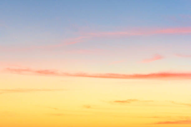 istock Colorful Sunset Sky Background with Clouds Over Sanibel Island Florida 1207770577